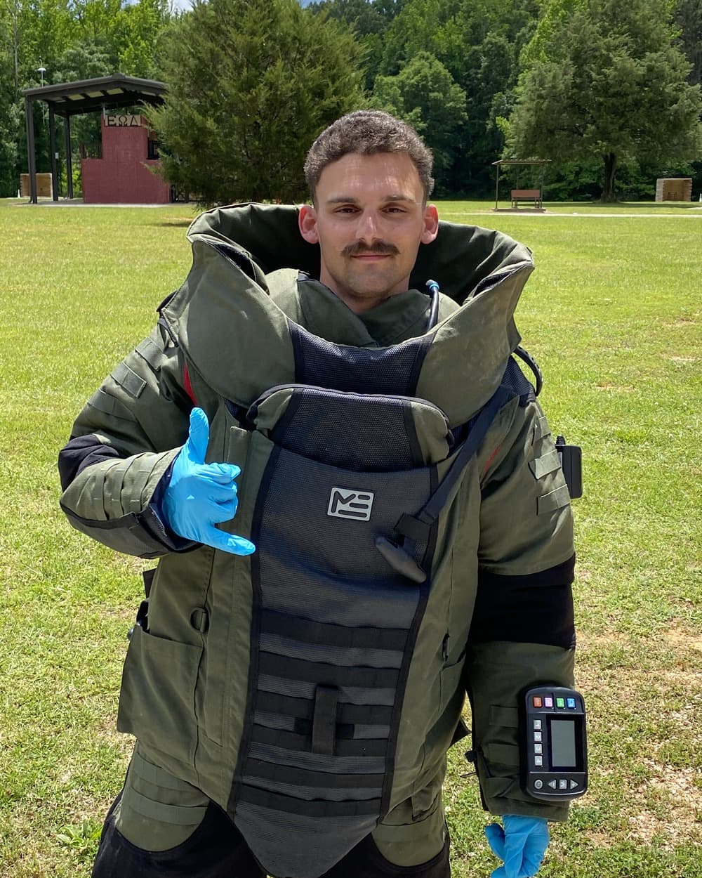 Brian Wielhouwer in an EOD bomb suit during his Marine Corps service